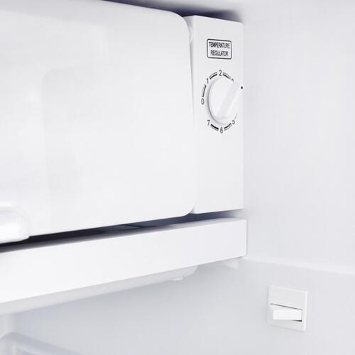 Купить Холодильник компактный   Tesler RC-95 белый  0192161. Характеристики, отзывы и цены в Донецке
