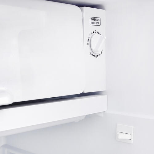 Купить Холодильник компактный   Tesler RC-95 черный  8106129. Характеристики, отзывы и цены в Донецке